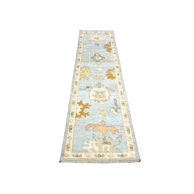 Condition: New Origin: Turkey Design: Oushak Actual size: 2'2" X 9'8" Thickness: 1/8" - 1/4" Colors: Light Blue, Ivory,...