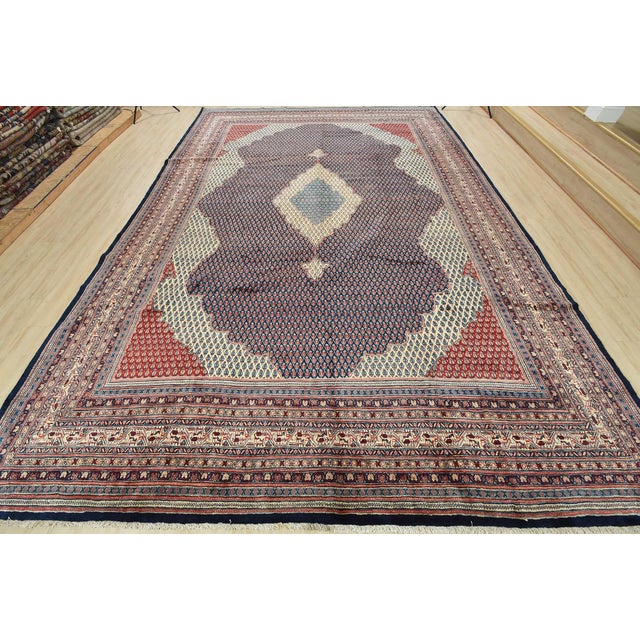An authentic vintage traditional Mir rug hand-knotted with fine wool and natural dyes. This oriental rug features a...