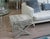 This lovely bench, ottoman, or footstool in faux python skin is crafted with fully upholstered designs reminiscent of...
