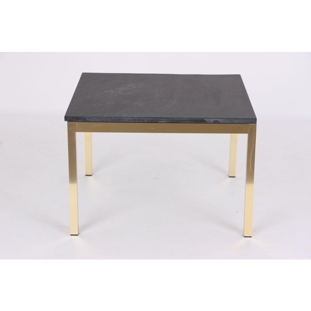 Coffee Table in Brass-Coated Metal with a Black Slate Top, 1970s, in Good conditions. Designed 1970 to 1979