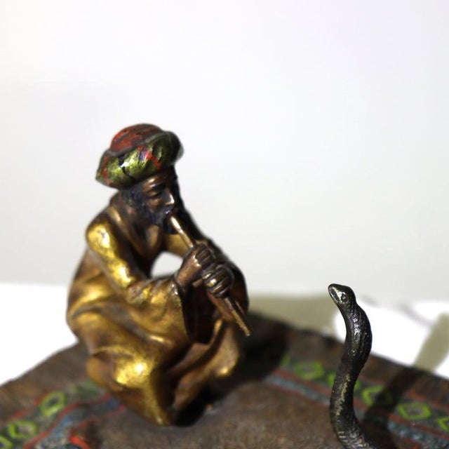 Franz Bergman Cold Painted Bronze Figure Of Snake Charmer Unsigned C1910. Measures - 2 1/2" x 4 1/4" x 3 3/4". A cold-...