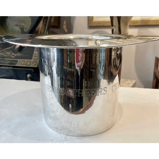 Just arrived from England this Silver Plate Large Top Hat Bottle Cooler, engraved with the word Chers all around the top...
