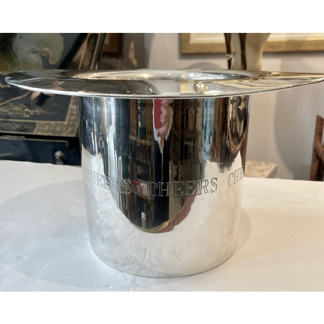 Just arrived from England this Silver Plate Large Top Hat Bottle Cooler, engraved with the word Chers all around the top...