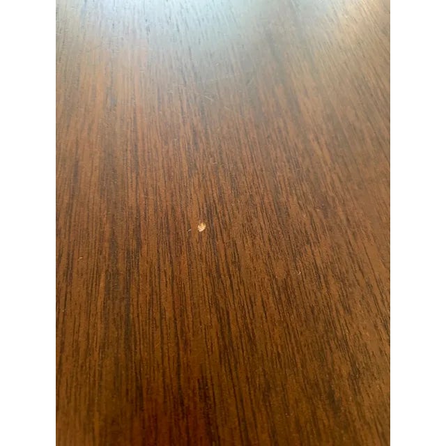 This is a stunning table by Claudia Moreira Salles. This table makes a statement for sure. The base alone measure 79"...