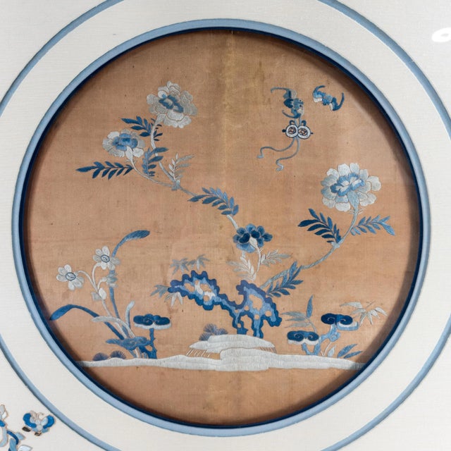 We are selling this antique Chinese silk robe fragment in a frame. This embroidered silk panel is probably from a robe or...