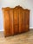 A striking Vintage French Louis wardrobe , crafted in oak and featuring an impressive four-door design with flowing shaped...