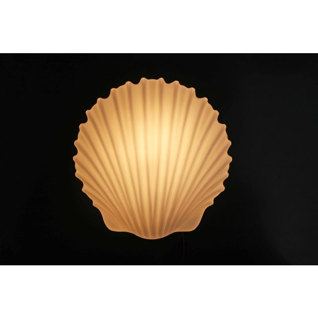 Large Shell Wall Lamp in Opal Glass from Glashütte Limburg, 1970s, in Very Good conditions. Designed 1970 to 1979 This...