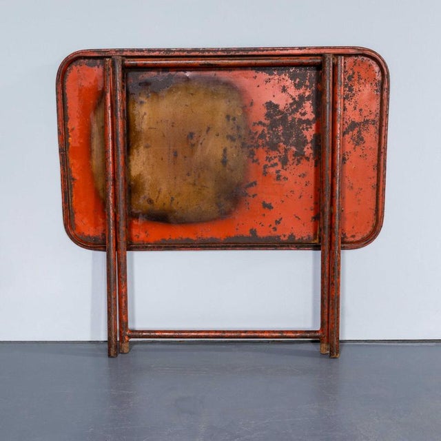 1970's Heavy Duty Folding Red Metal Dining Tables. Good quality heavy weight French metal tables. They fold almost flat...