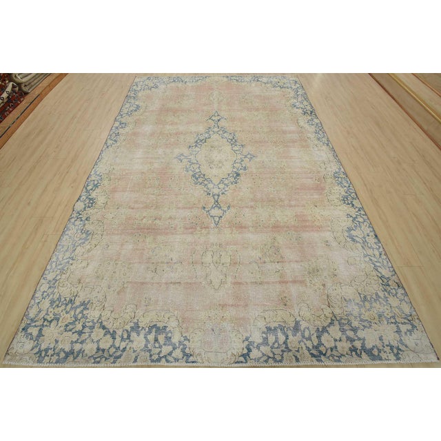 An authentic vintage traditional Kerman rug hand-knotted with fine wool and natural dyes. This oriental rug features a...