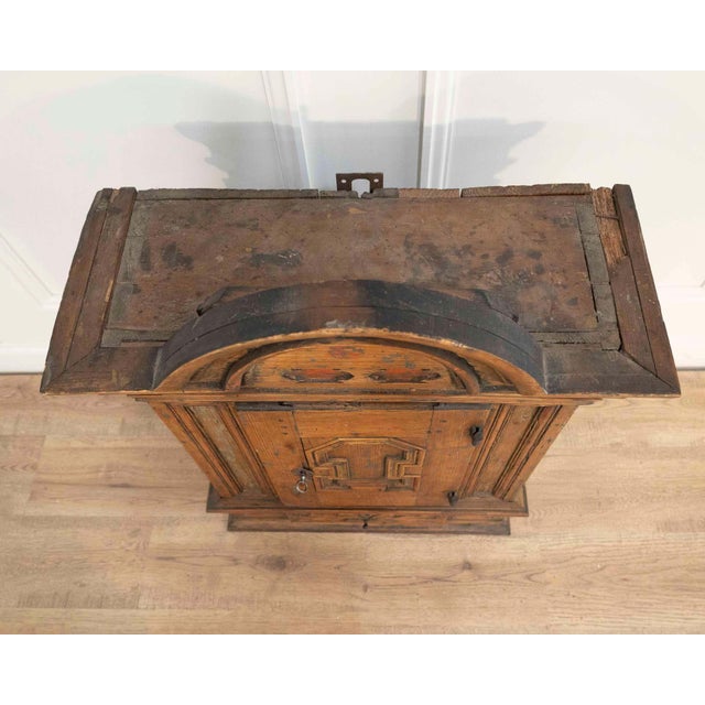 An early nineteenth-century wall cabinet from Stockholm, showcasing the distinctive craftsmanship and regional character...