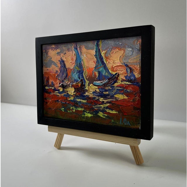 The Oil painting Canvas titled “Sailboats and orange sunset” captures the breathtaking drama of the sea when evening light...