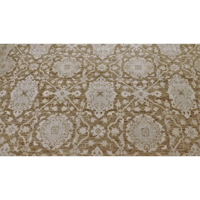 Geometric motifs on neutral brown field. Zero cut low pile. Vegetable dyes. Handmade. 8'1"x 10'