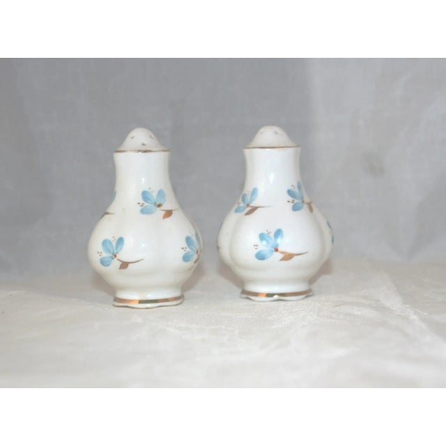 Vintage Salt and Pepper Shakers These vintage bone china salt and pepper shakers were made in England during the 1950s by...