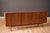 Vintage triple dresser chest designed by Jack Cartwright for Founders Company, circa 1960s. Features natural walnut...