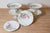 English porcelain compotes and plates from the 20th century, with floral décor and gilded trim, priced and sold...