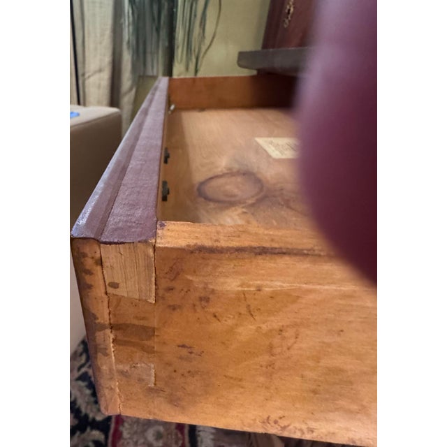 A beautifully crafted Queen Anne bedside chest by renowned Massachusetts furniture maker Eldred Wheeler, celebrated for...