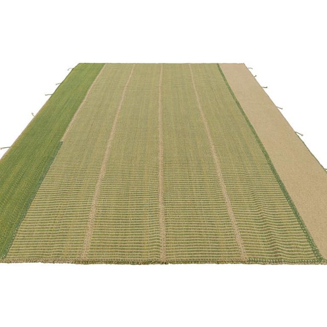 Handwoven in wool, a 10x13 Kilim design from an inventive new contemporary flat weave collection by Rug & Kilim. On the...