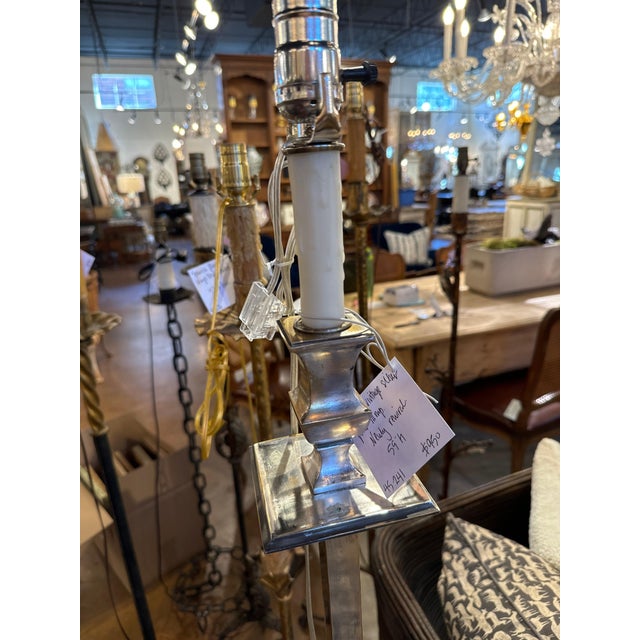 Spanish mid century silver plated floor lamp. Newly rewired with wax candle cover. 59” h to socket 45-241