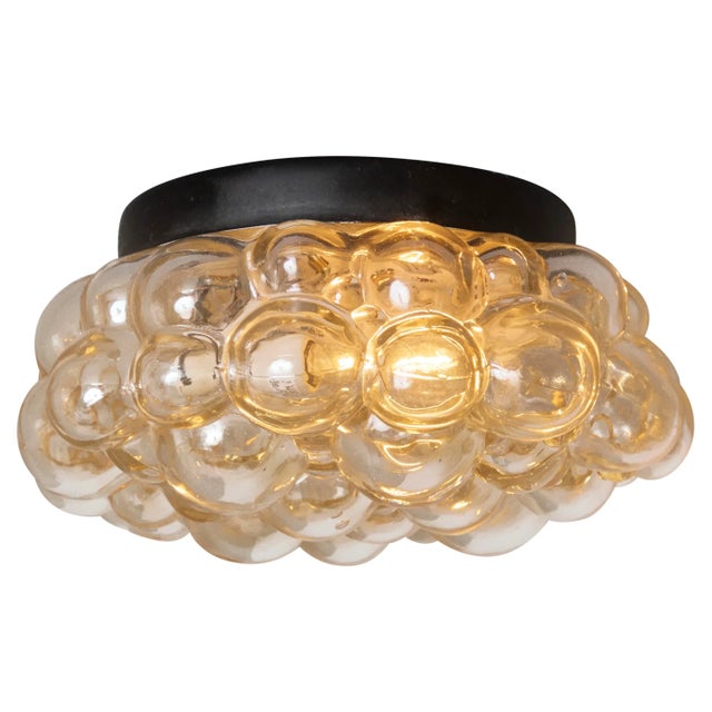 Petite 1960s Helena Tynell Amber Bubble Glass Flush Mount for Limburg. Executed in thick and heavy textured amber bubble...