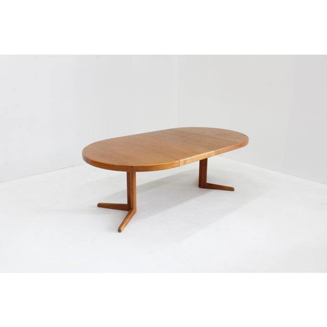 Vintage Danish round extendable dining table from the 1960s made of teak wood designed by Bramin. This Danish dining table...