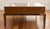 High-end, custom-made coffee table crafted from natural solid wood with a stainless steel finish. Originally commissioned...