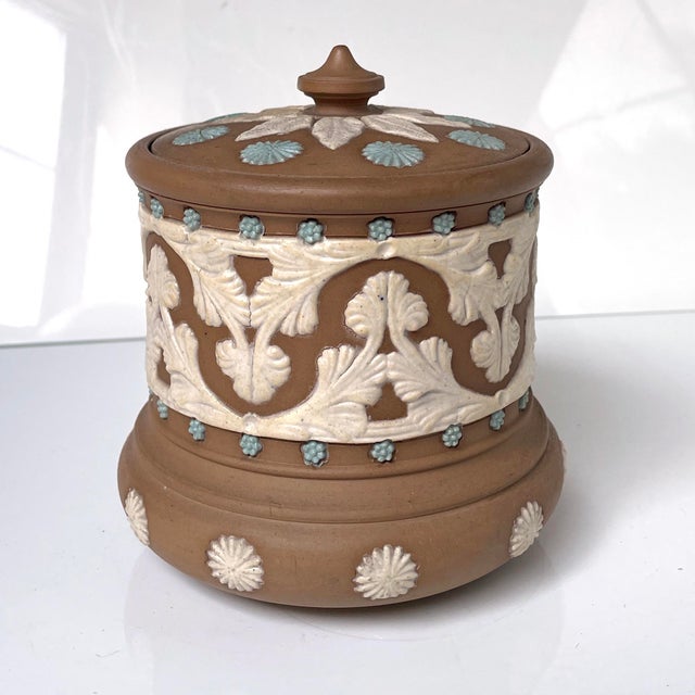 A wonderful Doulton Lambeth, England humidor or tobacco jar with original lid made in the 1880s in the Silicon line of...