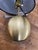 Absolutely darling little pair of Kate Spade “bubble” lamps in neutral brushed gold with original black fabric shades....
