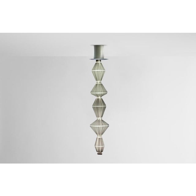 Oiphorique t pe suspension lamp designed by atelier oi in 2014. manufactured by parachilna (spain) oïphorique displays an...