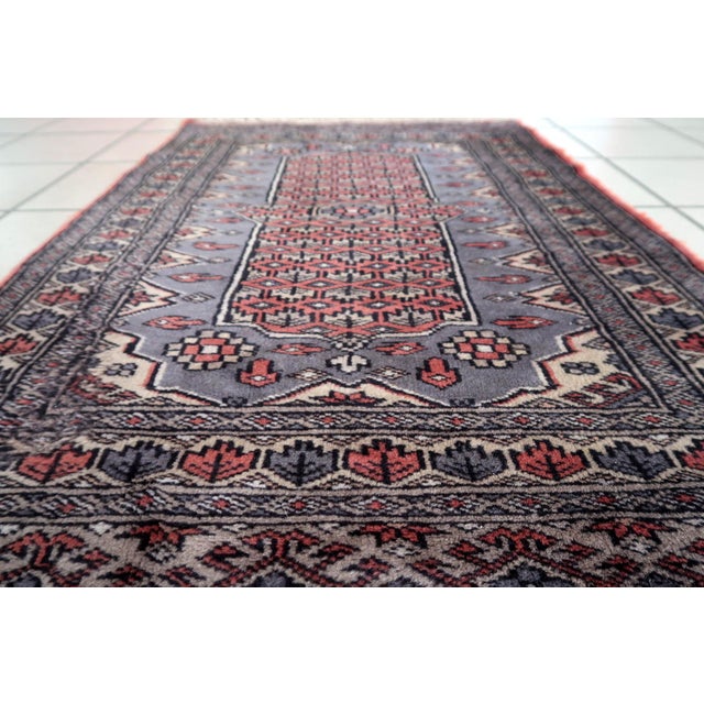 Handmade Vintage Uzbek Bukhara Rug – 2.1' x 3.1' – 1950s – Wool – Geometric Design Captivating Vintage Elegance – Discover...