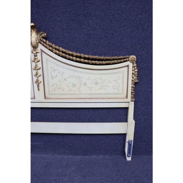 Regency style paint decorated headboard with gilded plume design and accents.