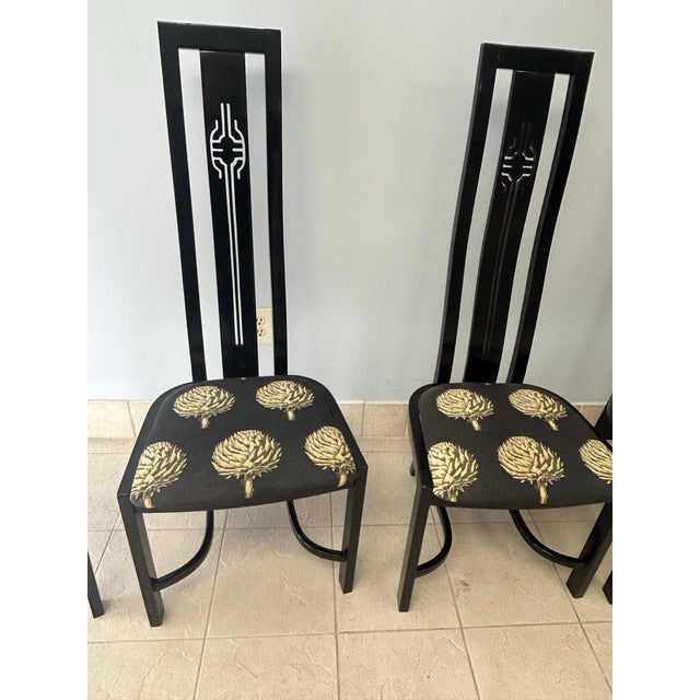Four black lacquer Art Nouveau style dining chairs. Comfortably arched high backs and clean, intact artichoke design...