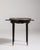 A classic French bouillotte table featuring a marble top and brass detailing. Traditionally used for gaming, the design...