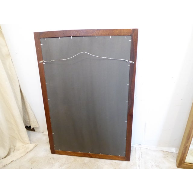 This Indian bone inlay hardwood mirror measures 39.5"H x 27.25"W and hangs vertically, though if you change the hangers,...