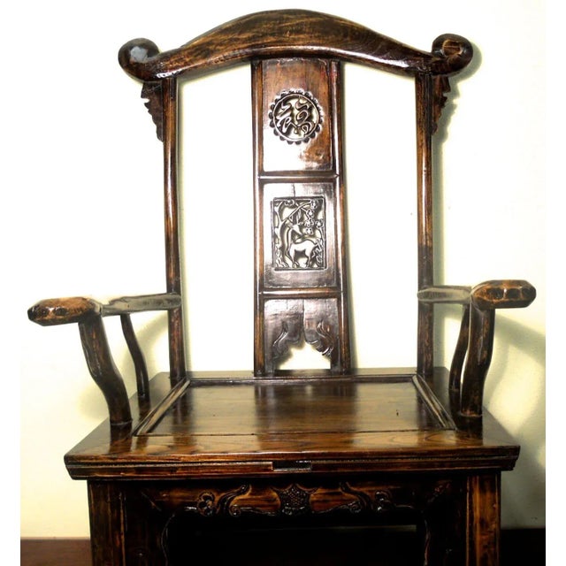 This style of chair is known as the "official's hat chair" because the projections over the rear stiles resemble the knobs...