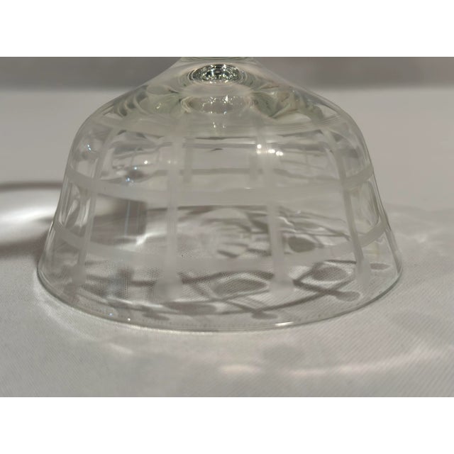 6” High x 3.75” diameter; 6 ounceh an etched geometric design.