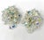 This is part of Chairish’s Costume Jewelry assortment. There is something very Go Go about this pair. These earrings are...