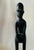 Exude curated, global sophistication with this striking mid-century hand-carved ebony wood sculpture depicting a...