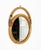 Midcentury beautiful round wall mirror in rattan and bamboo. Made in Italy in the 1970s.