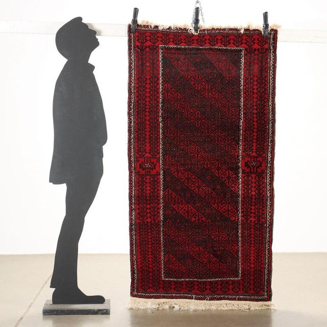 Beluchi rug in wool, fine knot and manual manufacturing. This piece is attributed to the mentioned designer/maker. It has...