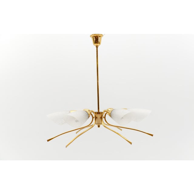 Lovely Mid-Century Modern 6-Armed Brass Sputnik Lamp, 1950s Rare and elegant midcentury ceiling lamp, 1950s. Executed in...