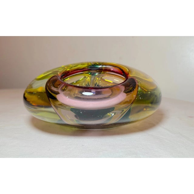 Up for sale is a large vintage hand blown Murano 3 chamber art glass ashtray. It's blown out of thick multi colored glass...