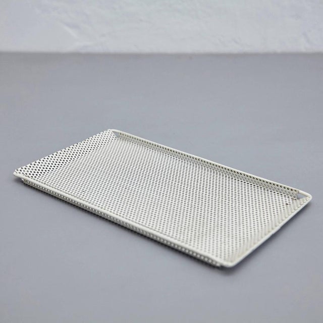 Enameled metal plate designed by Mathieu Mate´got. Manufactured by Artimeta (Holland), circa 1950. Lacquered perforated...