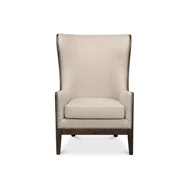 Updated Modern Classic Wingchair, covered in linen to make it neutral and easily placed in any environment. The real drama...