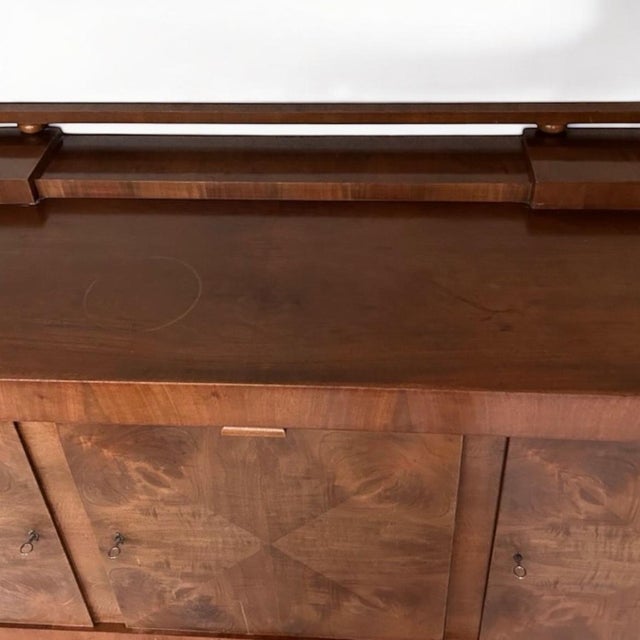 A beautiful Art Deco piece from Germany around the 1930s. This sideboard or credenza is distinguished by its high-quality...