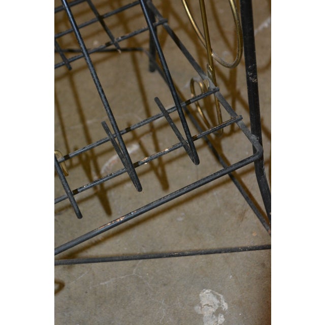 Great little vintage metal rack to hold a turntable, vinyl etc. Overall black with gold colored musical notes on either...