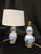 A stylish pair of mid-20th century chinoiserie porcelain table lamps, dating to approximately 1950s–1970s. Each lamp...