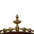 An oversized antique French oval wall mirror, dating to approximately 1880. The mirror features a carved gilt wood frame...
