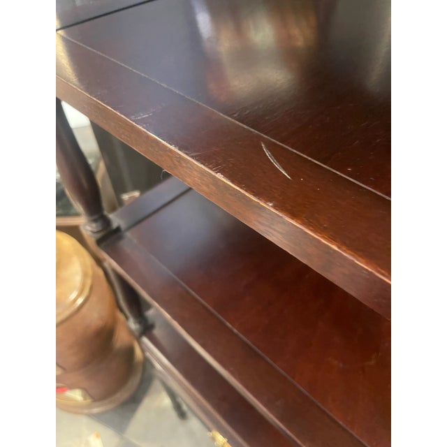 Step into history with this exquisite Mahogany Etagere, a faithful replica inspired by a piece originally crafted between...