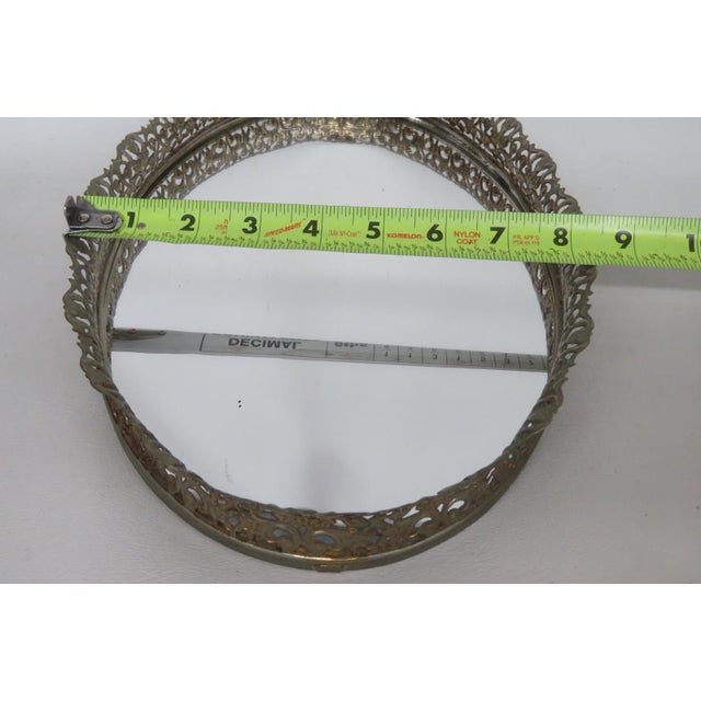 This beautiful Vanity / Dresser Tray is made of metal and mirrored glass. This gorgeous vintage piece features an ornate...