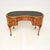 A beautiful antique burr walnut leather top kidney shaped desk. This was made in England, it dates from around the 1920’s...